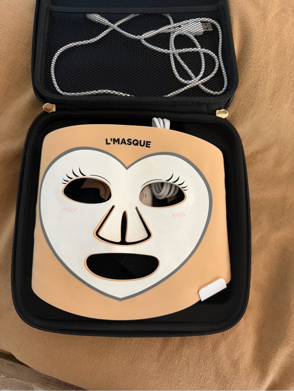 Red and blue light Facial Mask in Peach and White - At-Home Skin Rejuvenation.